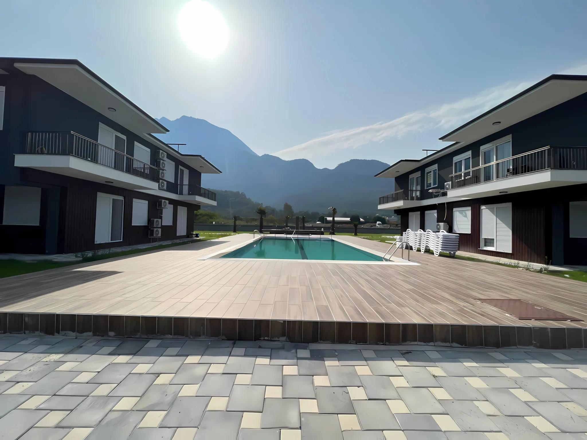 Bird's eye view of the swimming pool and garden at Palmiye Home